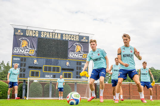 Jens Petter Hauge and Martin Ødegaard of the Norwegian