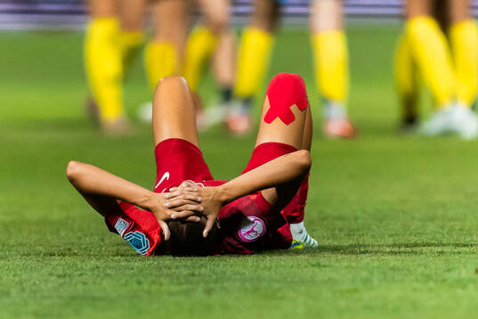 A player of Poland looks dejected