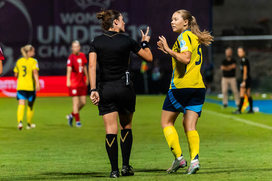 Paula Klingspor of Sweden and referee Deborah Bianchi