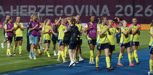 Players of Sweden celebrate