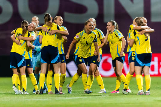 Players of Sweden celebrate