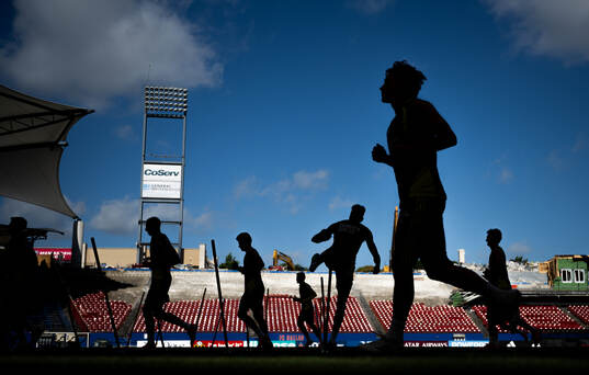 Players of the Swedish national football team in silhouette