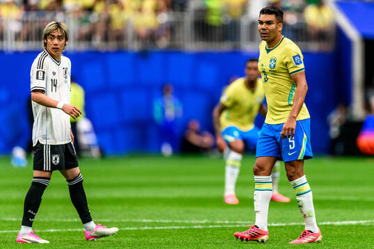 Junya Ito of Japan and Casemiro of Brazil