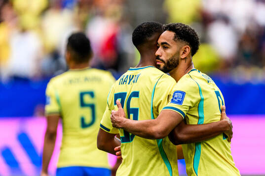 Rayan Cherki and Matheus Cunha of Brazil