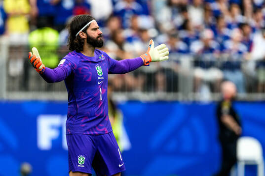 goalkeeper Alisson of Brazil