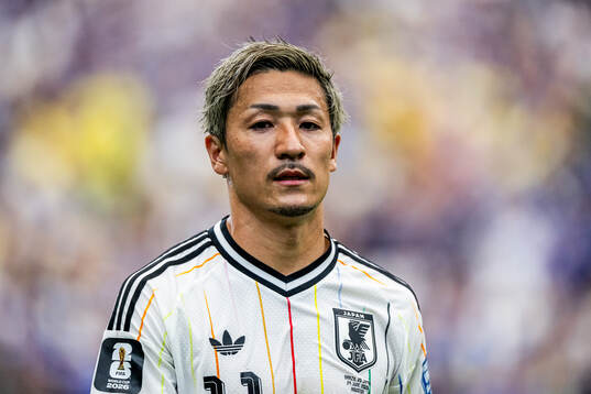Daizen Maeda of Japan looks dejected