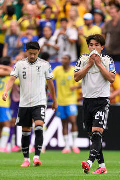 Kaishu Sano of Japan looks dejected