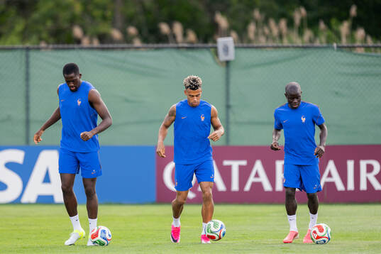 Ibrahima Konaté, Désiré Doué and N'Golo Kanté of the