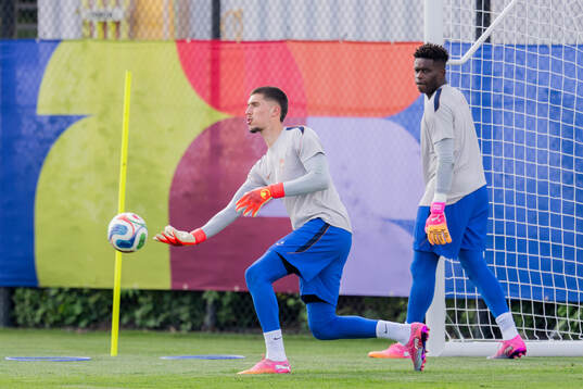 Goalkeeper Robin Risser and goalkeeper Brice Samba of the