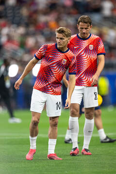 Martin Ødegaard and Sander Berge of Norway