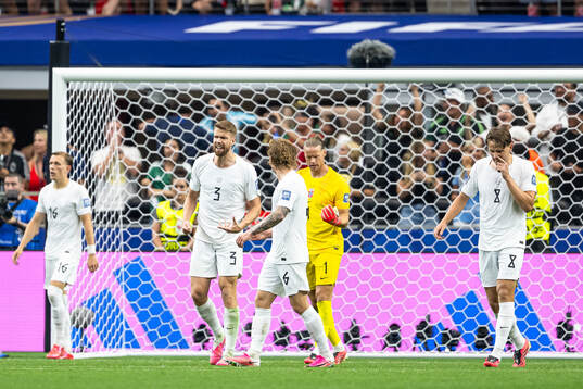 Players of Norway look dejected