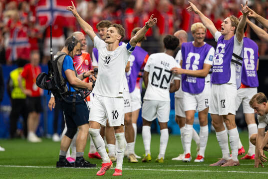 Martin Ødegaard of Norway celebrates