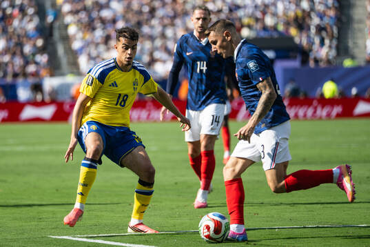 Yasin Ayari of Sweden and Lucas Digne of France