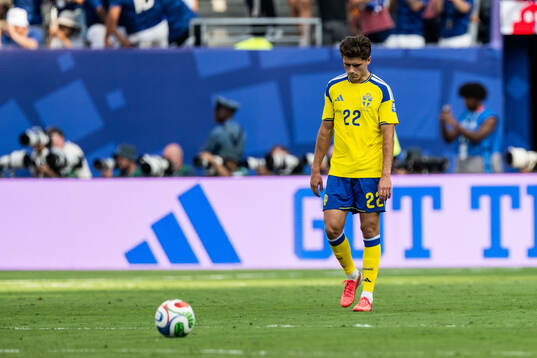 Besfort Zeneli of Sweden looks dejected