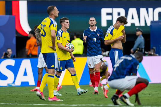 Viktor Gyökeres of Sweden looks dejected and Adrien Rabiot