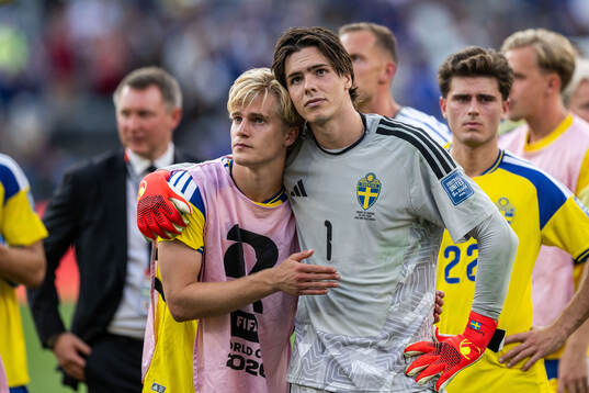 Lucas Bergvall and goalkeeper Jacob Widell Zetterström of