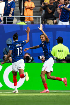 Michael Oliseand Malo Gusto of France celebrates 3-0