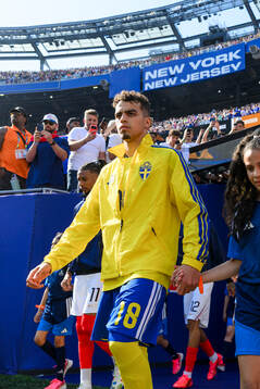 Yasin Ayari of Sweden enters the pitch