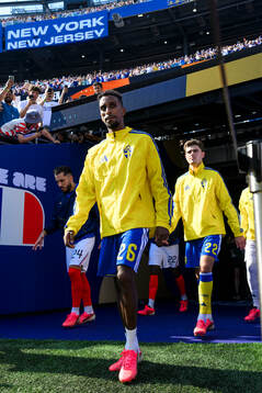 Taha Ali of Sweden enters the pitch