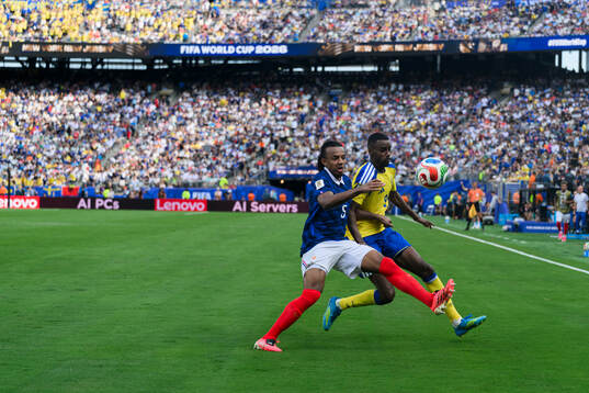 Jules Kounde of France and Alexander Isak of Sweden