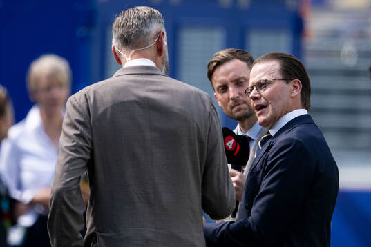 Olof Lundh and Axel Pileby of broadcaster TV4 with Prince