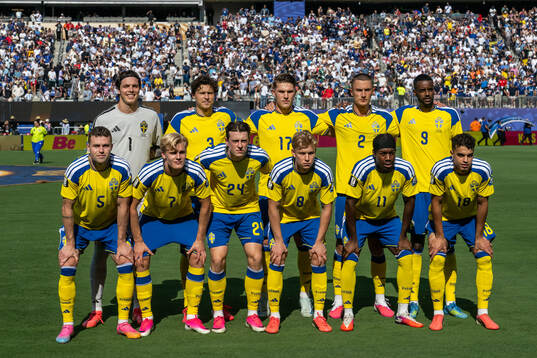 The starting eleven of Sweden pose for a team photo. From