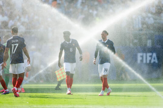 Aurelien Tchouameni and Adrien Rabiot of France