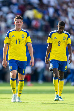 Viktor Gyökeres and Alexander Isak of Sweden look dejected