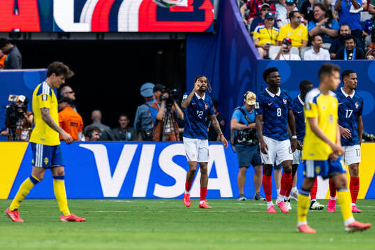 Bradley Barcola of France celebrates