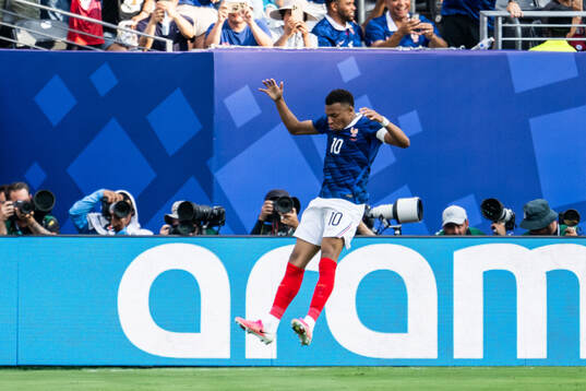 Kylian Mbappe of France celebrates