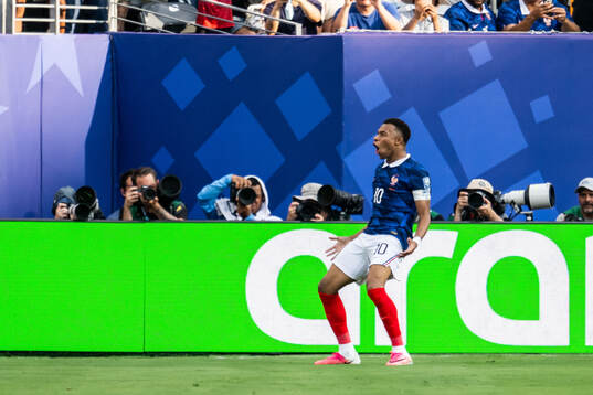 Kylian Mbappe of France celebrates