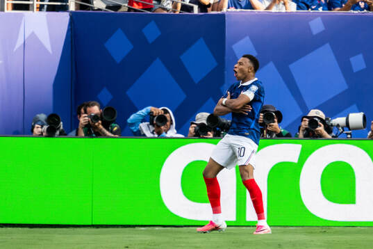 Kylian Mbappe of France celebrates