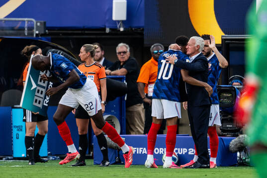 Kylian Mbappe and head coach Didier Claude Deschamps of
