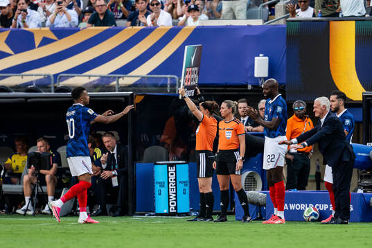 Kylian Mbappe and head coach Didier Claude Deschamps of