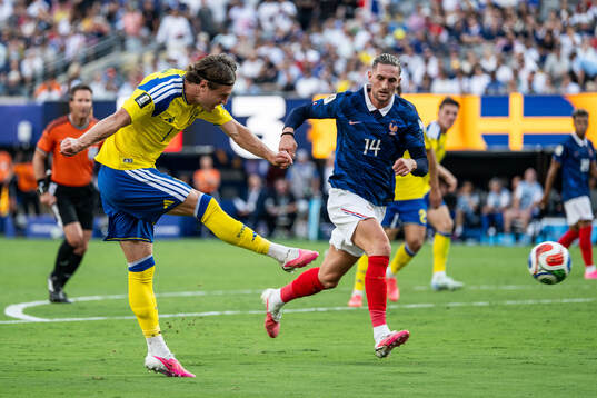 Mattias Svanberg of Sweden and Adrien Rabiot of France
