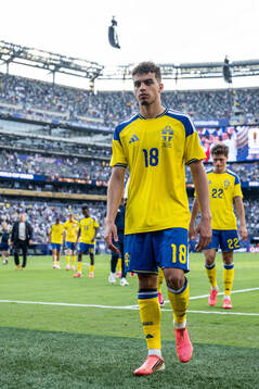 Yasin Ayari of Sweden looks dejected