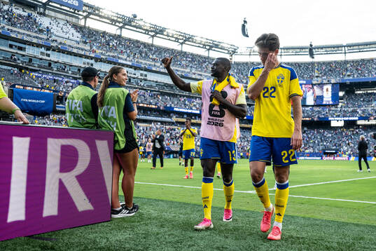 Ken Sema and Besfort Zeneli of Sweden looks dejected