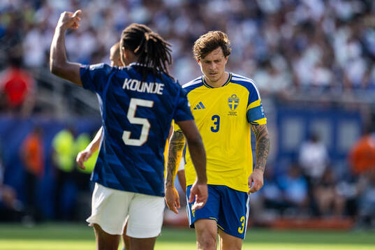 Victor Nilsson Lindelöf of Sweden looks dejected