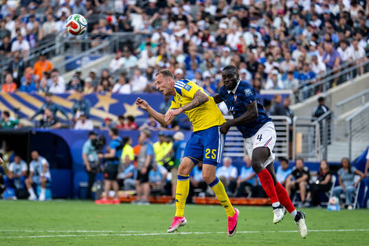 Gustaf Nilsson of Sweden and Dayot Upamecano of France