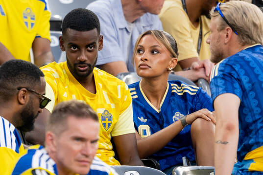 Alexander Isak of Sweden with family and friends
