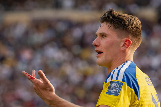Viktor Gyökeres of Sweden is seen bleeding