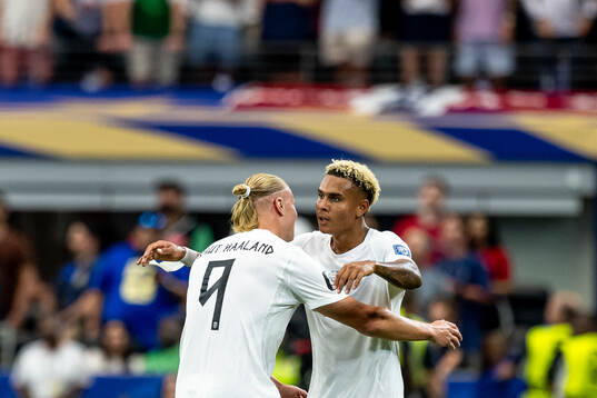 Antonio Nusa and Erling Braut Haaland of Norway celebrates