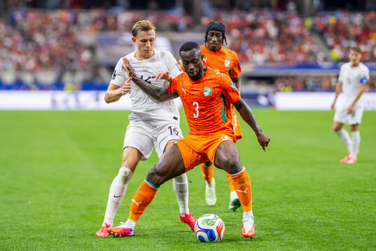 Marcus Holmgren Pedersen of Norway and Ghislain Konan of