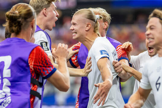 Erling Braut Haaland of Norway celebrates with Jens Petter