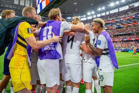 Erling Braut Haaland of Norway celebrates with goalkeeper