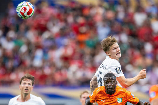 David Møller Wolfe of Norway and Nicolas Pepe of Côte