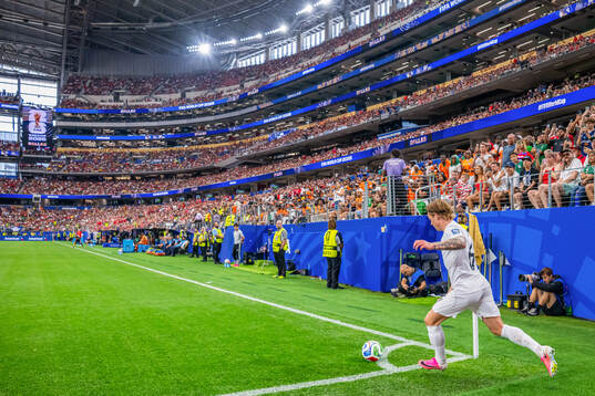 Patrick Berg of Norway takes a corner kick