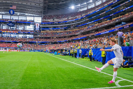 Patrick Berg of Norway takes a corner kick