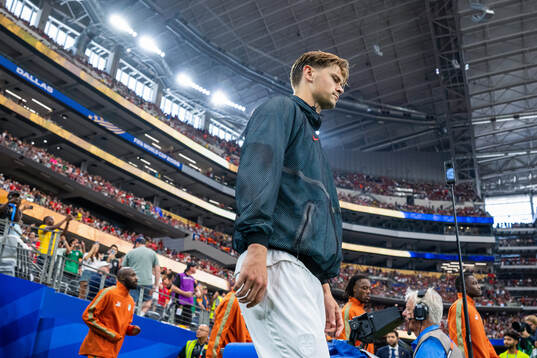 Henrik Falchener of Norway enters the pitch