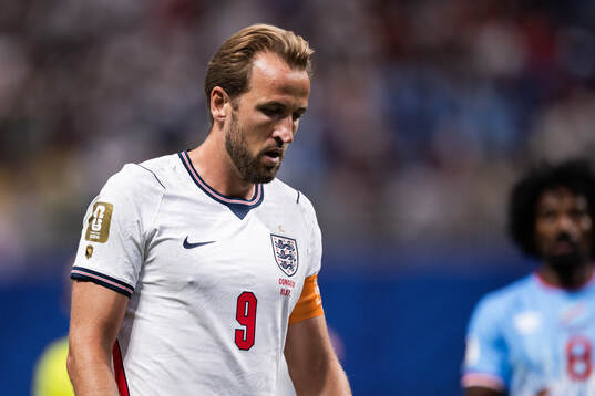 Harry Kane of England looks dejected